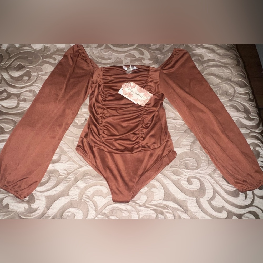 B.O.G bodysuit. Color “Blush-glutch”